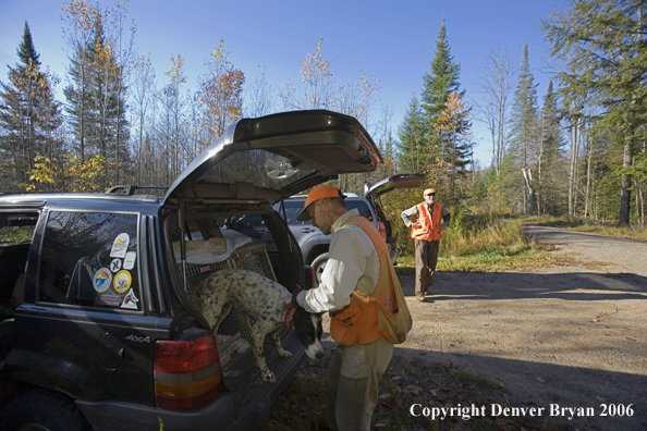 Upland bird hunter with dog 