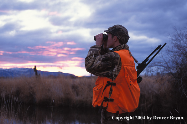 Big game hunter glassing.
