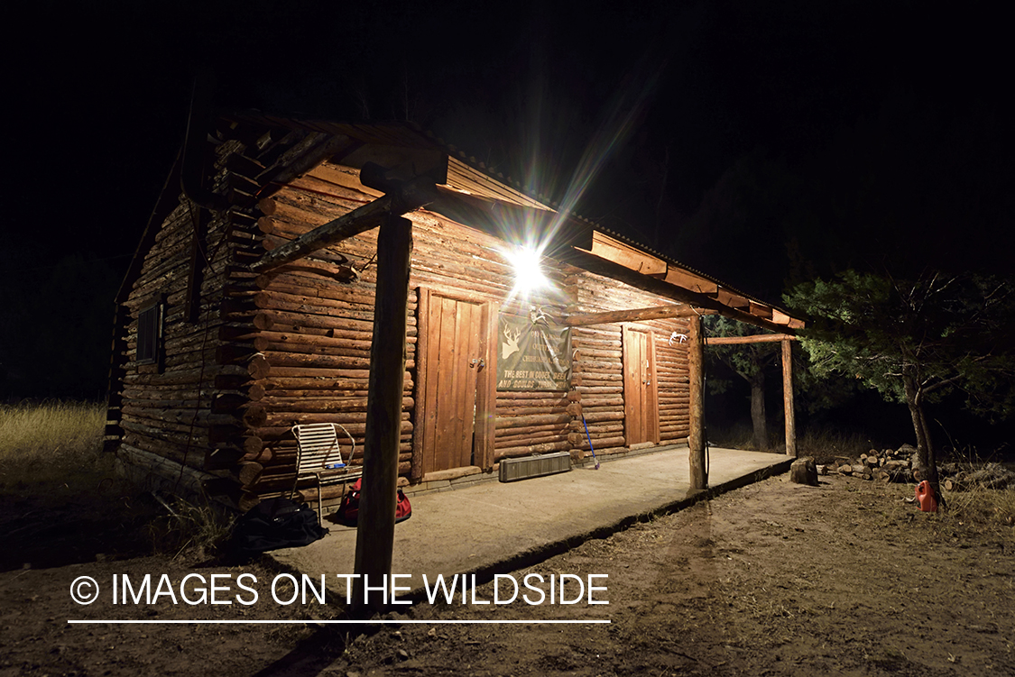 Hunter's cabin at night.