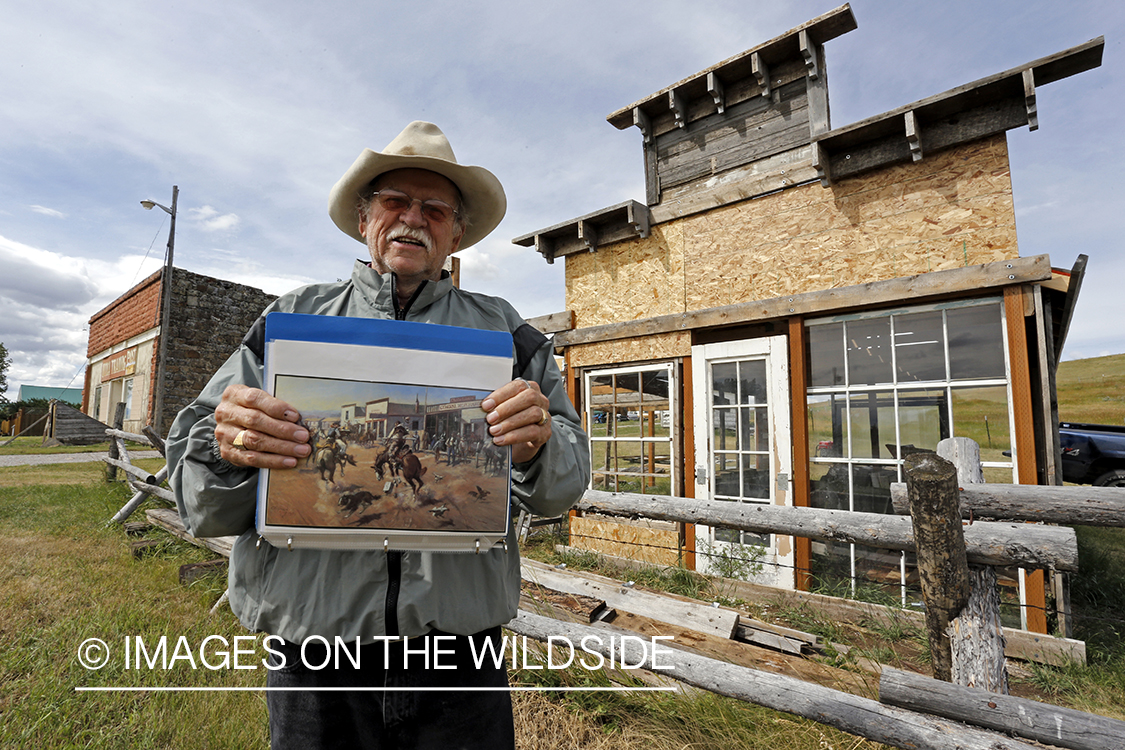 Dusty Don Waite building replica of Charlie Russel painting in Utica, Montana.