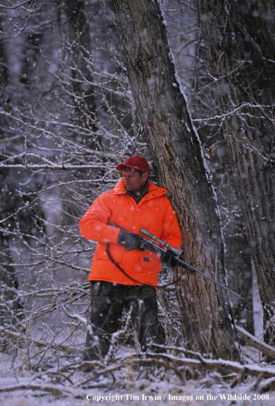 Big Game hunter in field