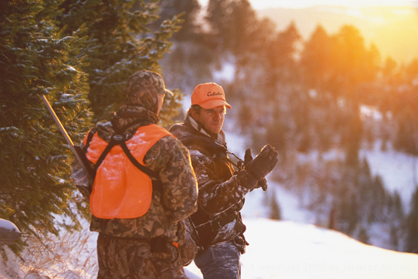Big game hunters at sunrise/sunset.