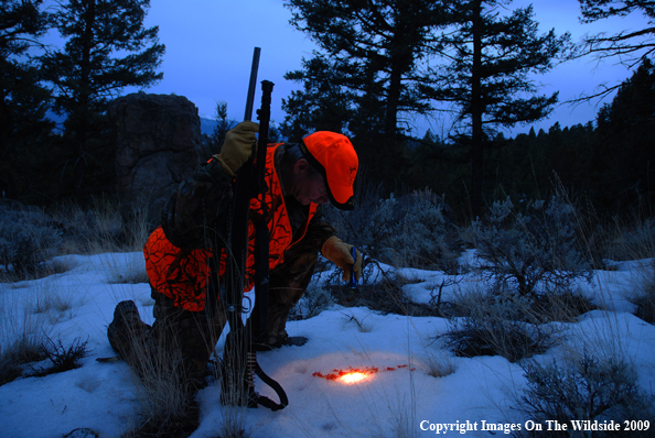 Hunter Following a Blood Trail