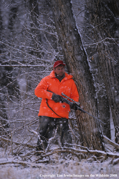 Big Game hunter in field