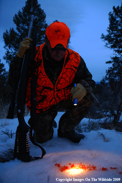 Hunter Following a Blood Trail