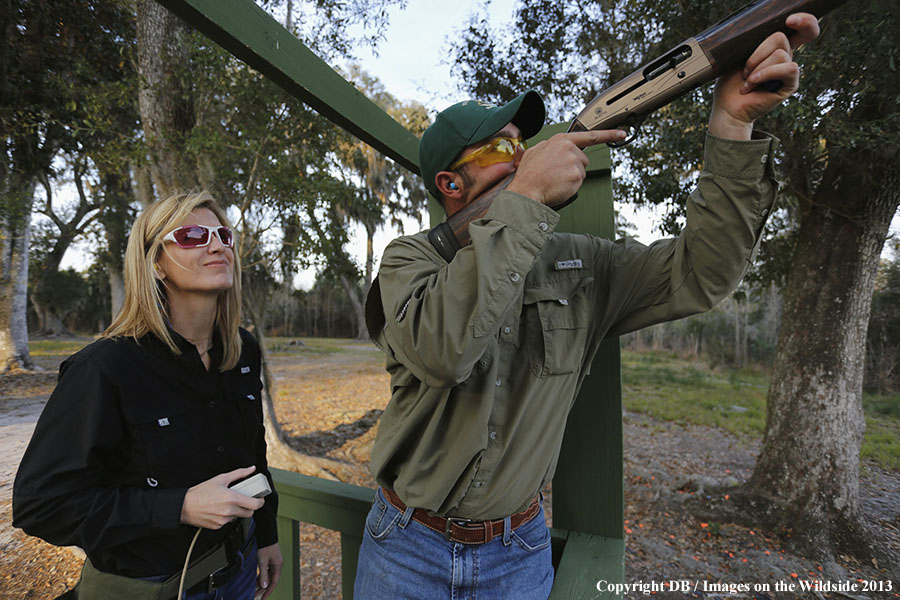 Shooters at sporting clay course. 