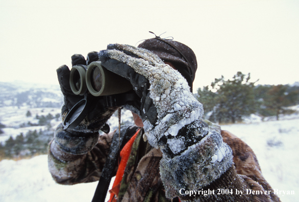 Big game hunter glassing.