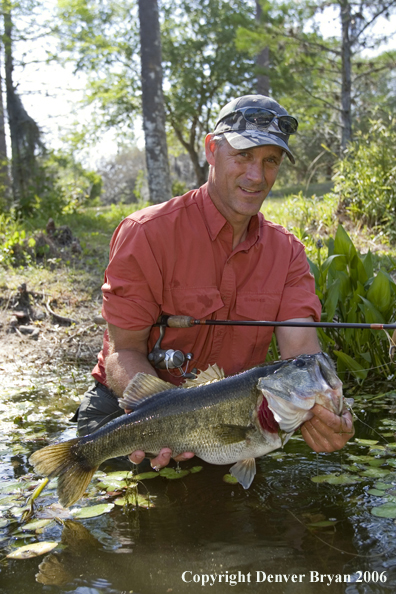 Fisherman with Largemouth Bass.  