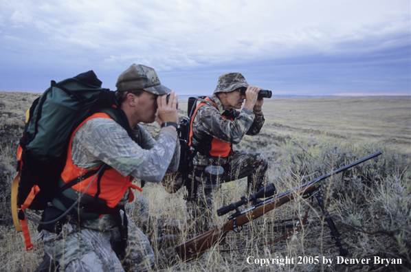 Big game hunters scoping for game.