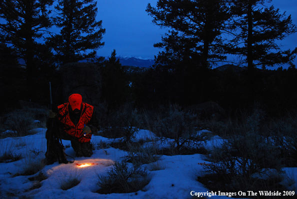 Hunter Following a Blood Trail