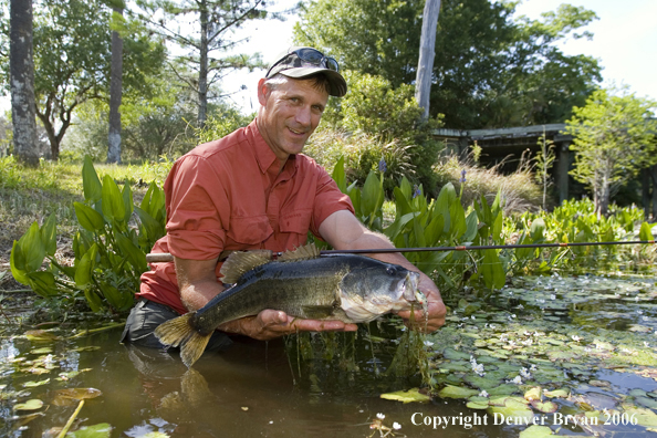 Fisherman with Largemouth Bass.  