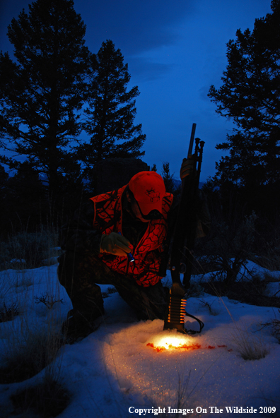 Hunter Following a Blood Trail