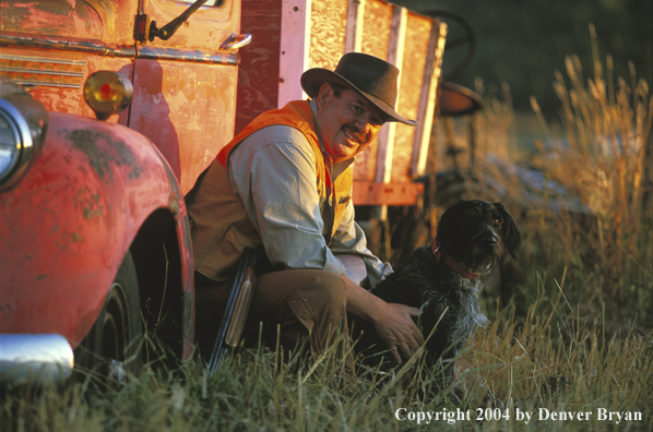Upland bird hunter with German Wirehair.