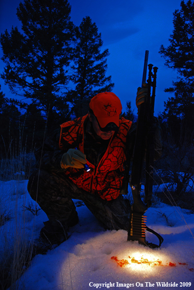 Hunter Following Blood Trail