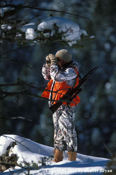 Big game hunter glassing.