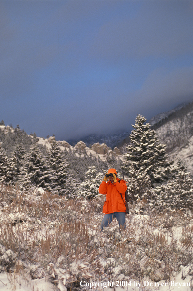 Big game hunter glassing.