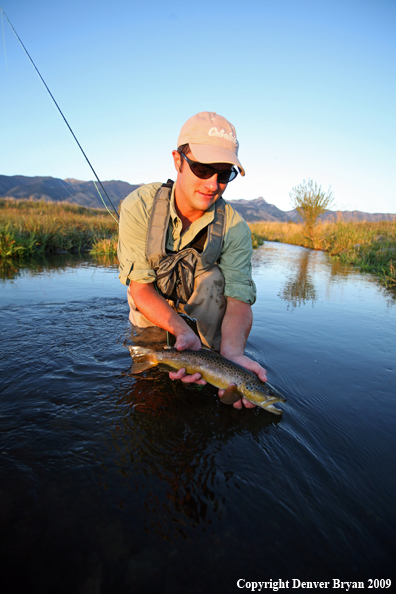 Flyfisherman with Brown Trout