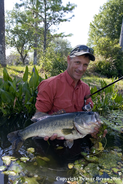 Fisherman with Largemouth Bass.  