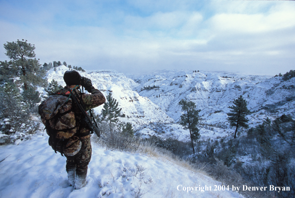 Big game hunter glassing.