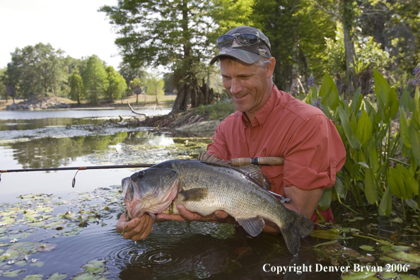 Fisherman with Largemouth Bass.  