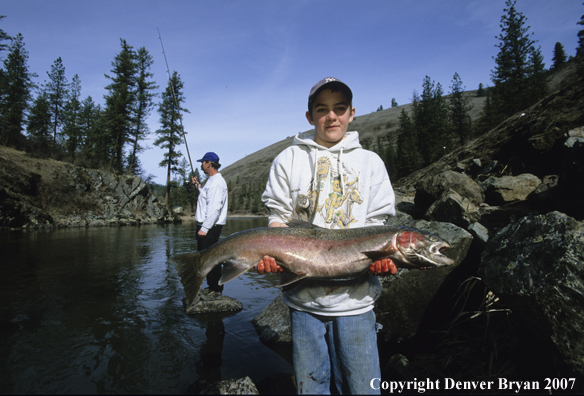 Young boy with nice steelhead