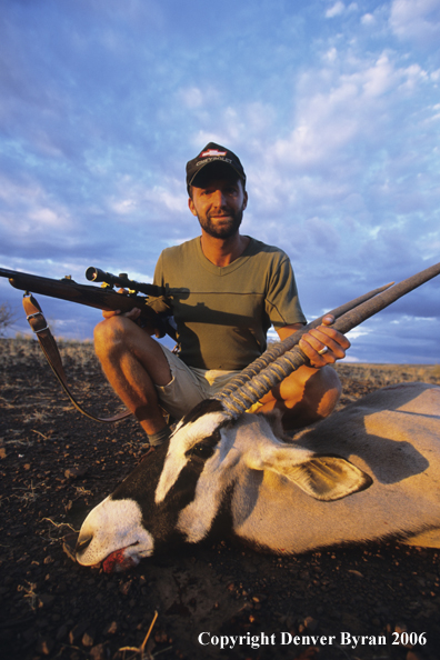 African hunter will downed oryx.