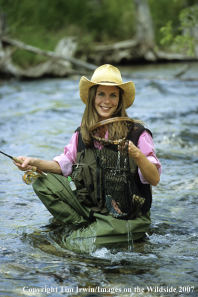 Woman freshwater flyfisher