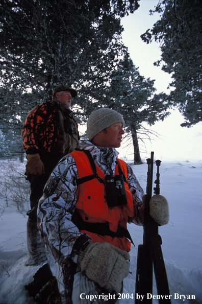 Big game hunters tracking game.