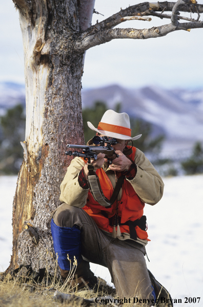 Big Game hunter aiming.