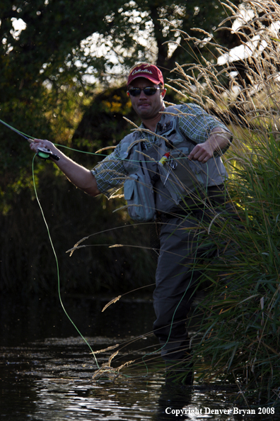 Flyfisherman casting line