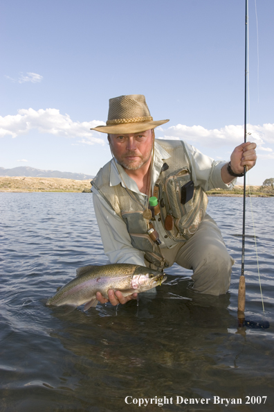 Flyfisherman with Rainbow Trout on Beaverhead River, Montana