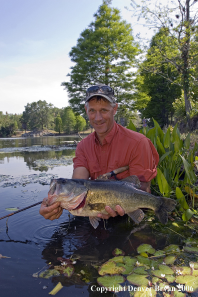 Fisherman with Largemouth Bass.  