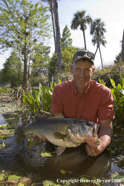 Fisherman with Largemouth Bass.  