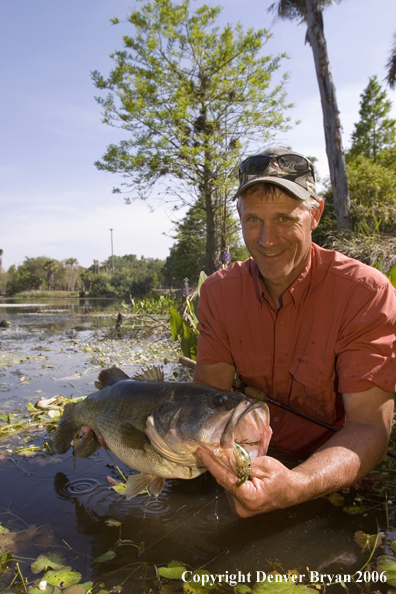Fisherman with Largemouth Bass.  