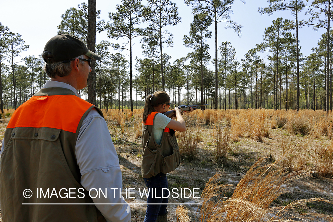 Child with parents hunting.