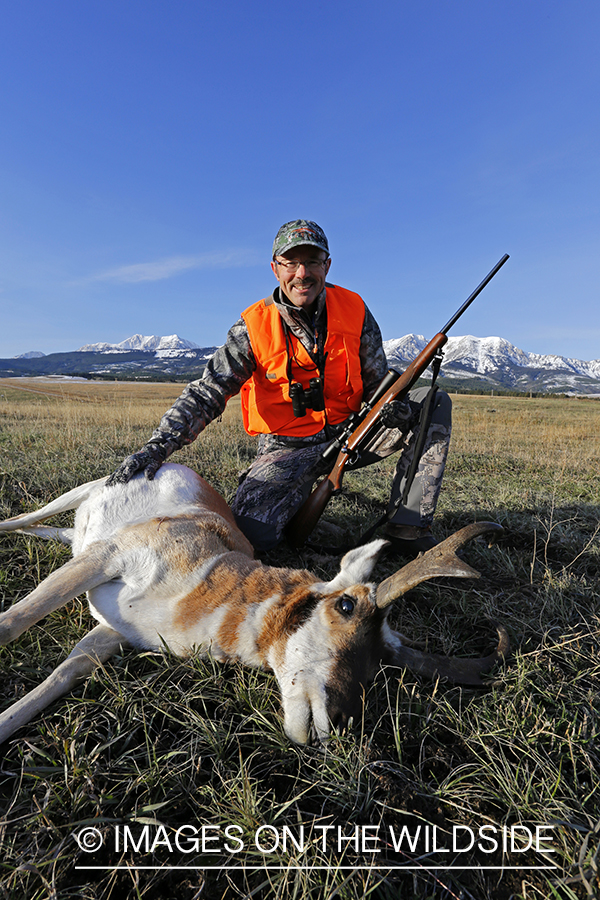 Pronghorn Antelope hunter with bagged antelope buck.
