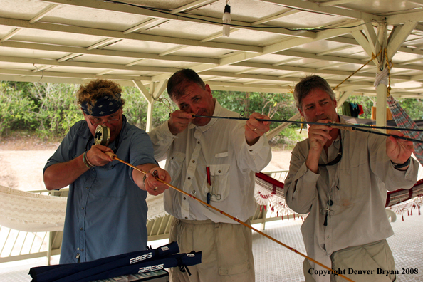 Flyfisherman checking their rods