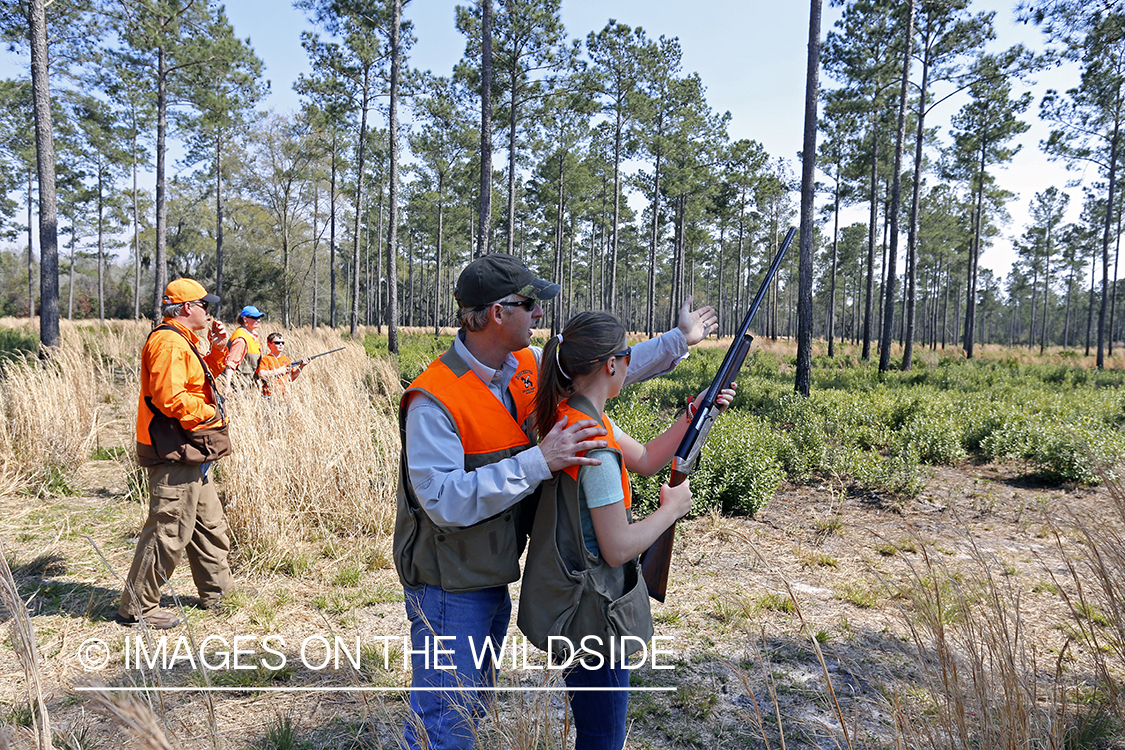Children with parents hunting.
