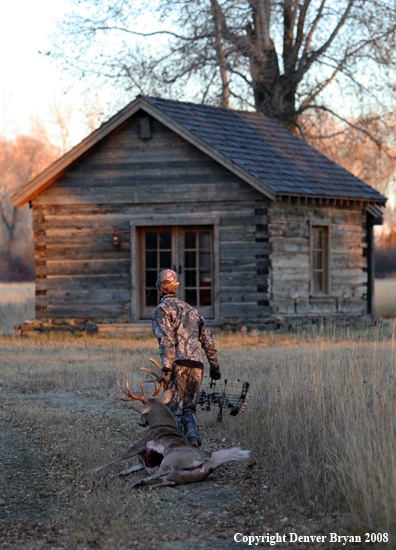 Bowhunter with Whitetail Deer