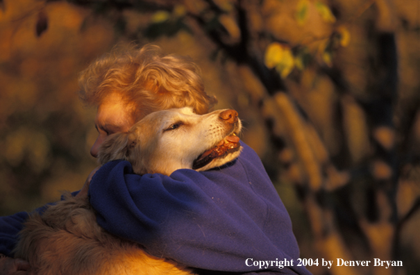Woman with golden Retriever