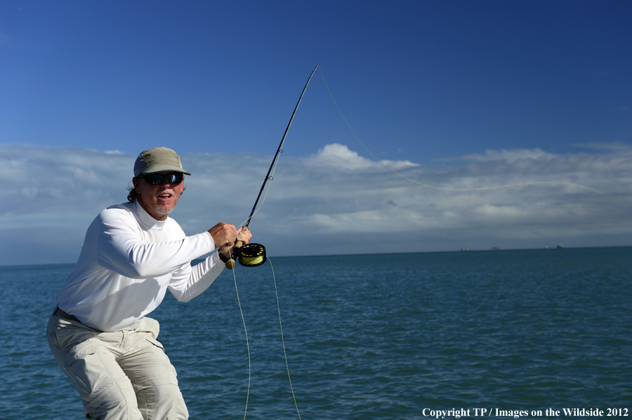 Flyfisherman casting. 