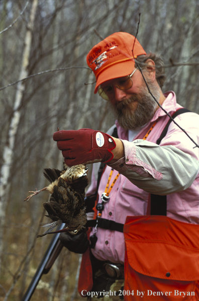 Upland bird hunter with bagged woodcock.