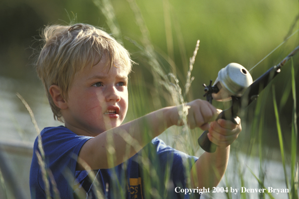 Boy spincast fishing