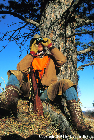 Big game hunter glassing.