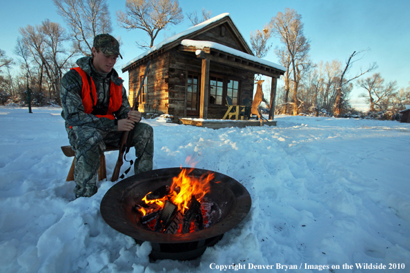 White-tailed deer hunter campfire
