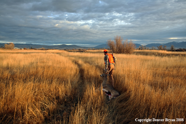 Hunter with Whitetail Deer