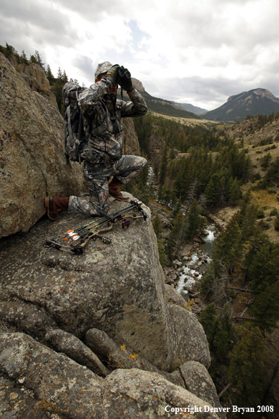 Bow Hunter Scouting For Big Game