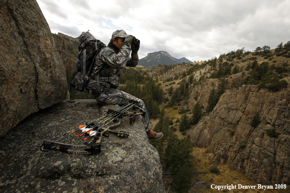 Bow Hunter Scouting For Big Game