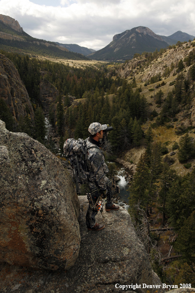 Bow Hunter Scouting For Big Game