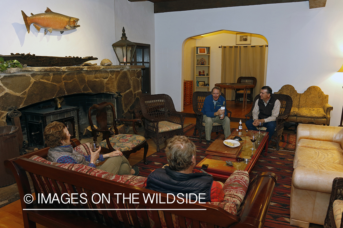 Upland game bird hunters in lodge.